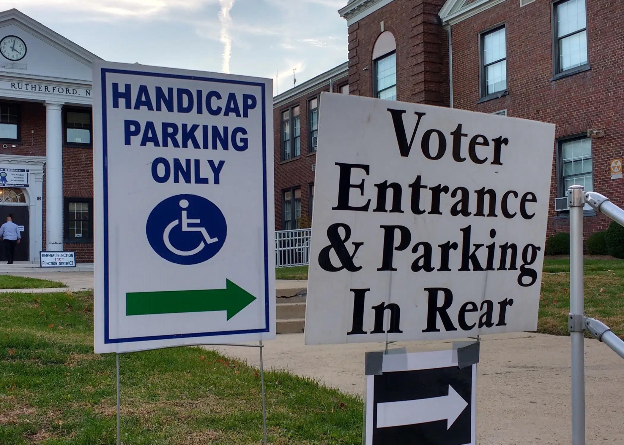 Signs for voter and handicap parking